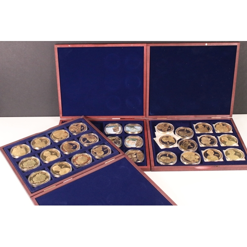 120 - A group of collectors coins within three wooden fitted cases to include The Queens Diamond Jubilee, ... 