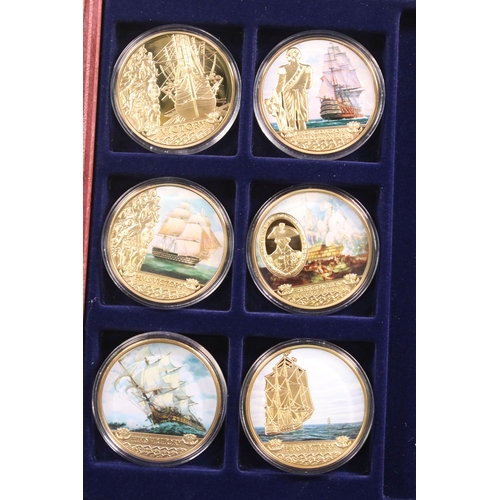 120 - A group of collectors coins within three wooden fitted cases to include The Queens Diamond Jubilee, ... 