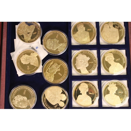 120 - A group of collectors coins within three wooden fitted cases to include The Queens Diamond Jubilee, ... 