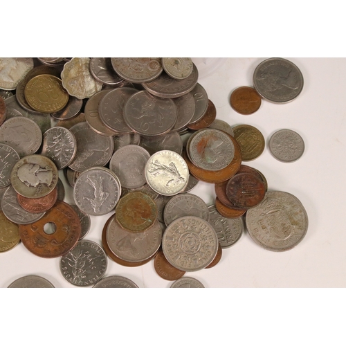 122 - A collection of British decimal, pre decimal and world coins to include some silver examples.