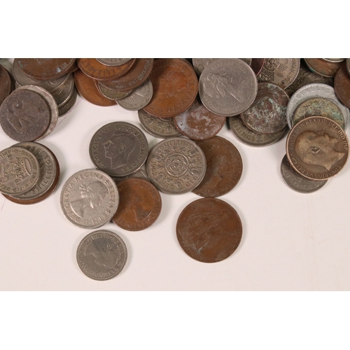 151 - A large collection of mixed British pre decimal and world coins to include commemorative and pre dec... 