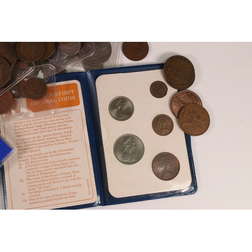 174 - A collection of mainly circulated British and world coins to include some pre decimal silver example... 