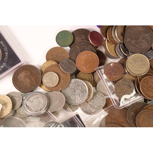 174 - A collection of mainly circulated British and world coins to include some pre decimal silver example... 