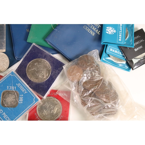 201 - A collection of mainly United Kingdom coins to include uncirculated, year sets, commemorative crowns... 