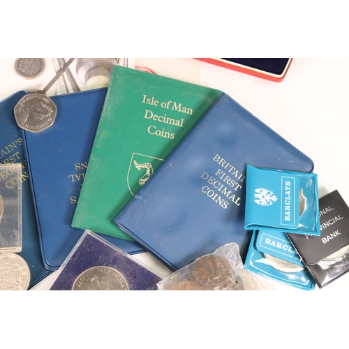 201 - A collection of mainly United Kingdom coins to include uncirculated, year sets, commemorative crowns... 