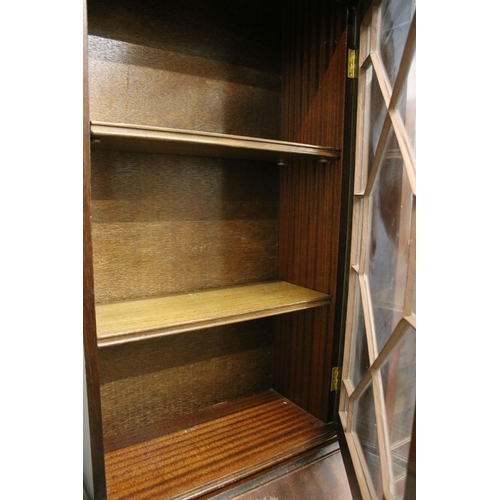 716 - 20th century mahogany four drawered veneered writing bureau bookcase with glazed front and pull down... 