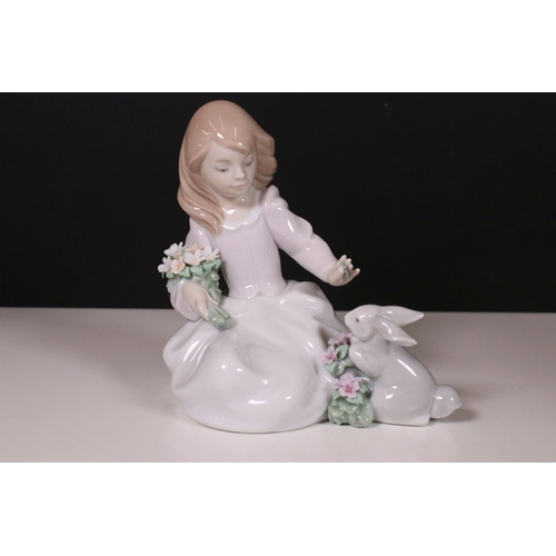 106 - Collection of Llladro and Nao figurines to include Lladro 2000 event figurine 6741, girl with mirror... 