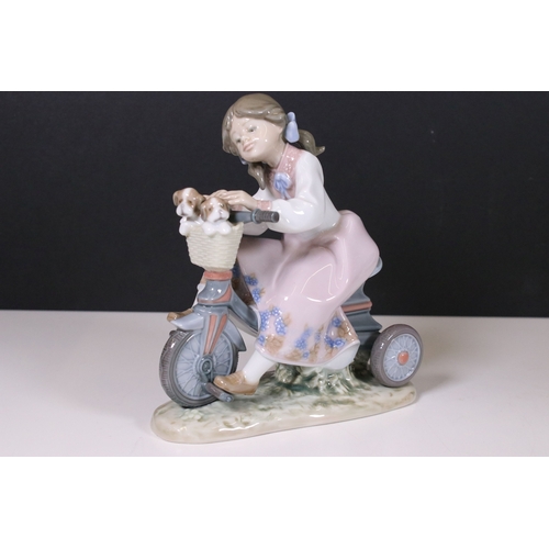 106 - Collection of Llladro and Nao figurines to include Lladro 2000 event figurine 6741, girl with mirror... 