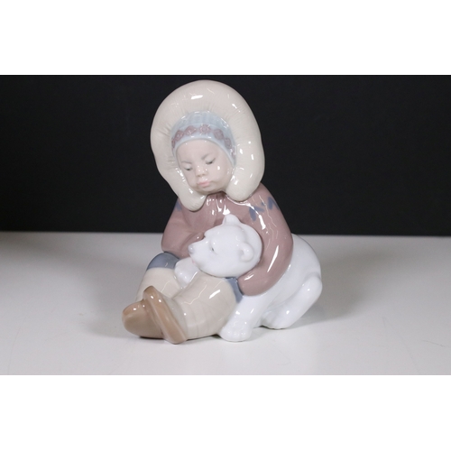 106 - Collection of Llladro and Nao figurines to include Lladro 2000 event figurine 6741, girl with mirror... 