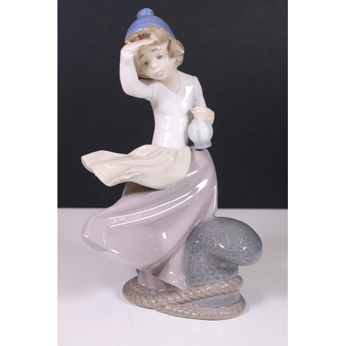 112 - Selection of Lladro and Nao figurines to include Valentine's cherub, seated girl, girl with bell, Ha... 