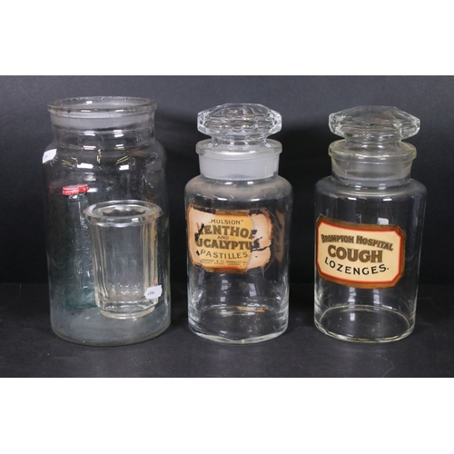 114 - Collection of vintage apothecary glass jars and bottles with original labels and one embossed exampl... 