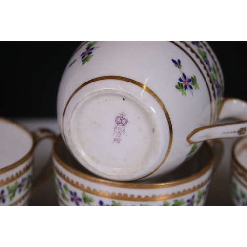 121 - Antique Derby porcelain floral border and gilt cups together with a tea pot dated 1864 to base, four... 