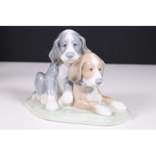 122 - Collection of Lladro and Nao dog related figurines to include 5401, Collectors Society 1989, 7612 5t... 