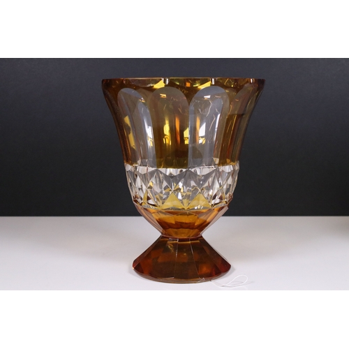 123 - Vintage glass vases to include large amber glass example and an love knot red glass centre piece