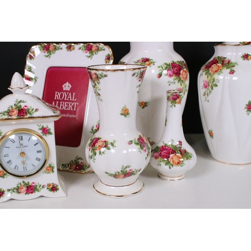 124 - Royal Albert 'Old Country Roses' items to include four vases in varying forms, trinket box, floral d... 