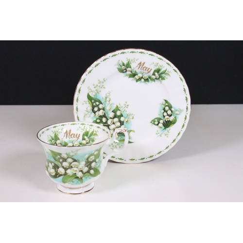 126 - Royal Albert 'Flower of the Month' series trio tea cups, saucers and plates sets, to include all mon... 