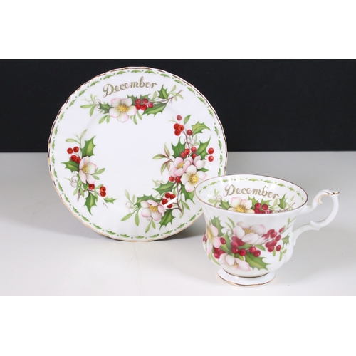 126 - Royal Albert 'Flower of the Month' series trio tea cups, saucers and plates sets, to include all mon... 