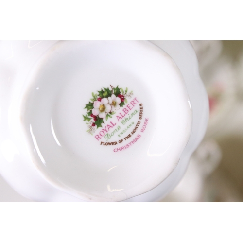 126 - Royal Albert 'Flower of the Month' series trio tea cups, saucers and plates sets, to include all mon... 