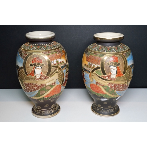 142 - Pair of Japanese hand painted baluster vases with ornate gold finish, H 33cm, character marked to ba... 