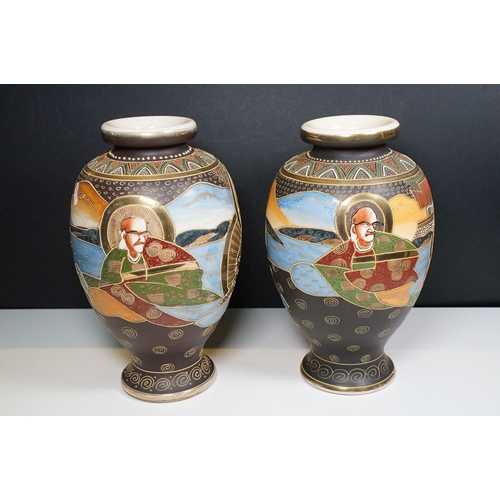 142 - Pair of Japanese hand painted baluster vases with ornate gold finish, H 33cm, character marked to ba... 