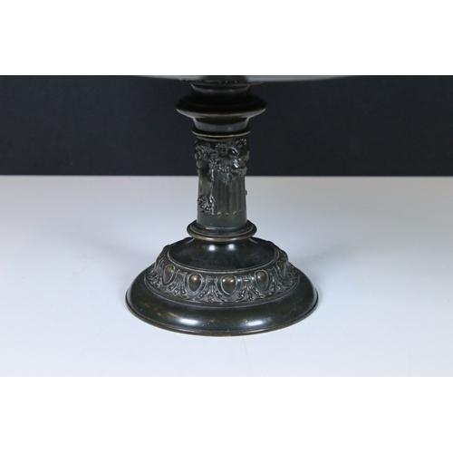 176 - 19th century bronze footed tazza with fighting beasts decoration to centre, H 17cm, 32cm diameter