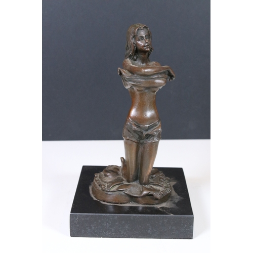 180 - 20th century bronze figurine of lady undressing, set on black marble base, signed Ponsard to side, a... 