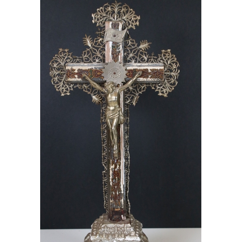 181 - Wooden table top alter decorated crucifix cross with metal Jesus and filigree atop a silvered wood b... 