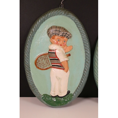 196 - Pair of 1930's style hand painted 3d relief oval paintings of tennis boy and girl with mushroom, H 3... 