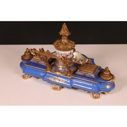 204 - Sevres style porcelain ink and pen stand with blue ground, floral decoration, ormolu mount and lids