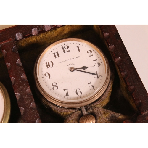 214 - Bright and Sons Ltd 8 days pocket watch and barometer set housed within a wooden carved edge case, W... 