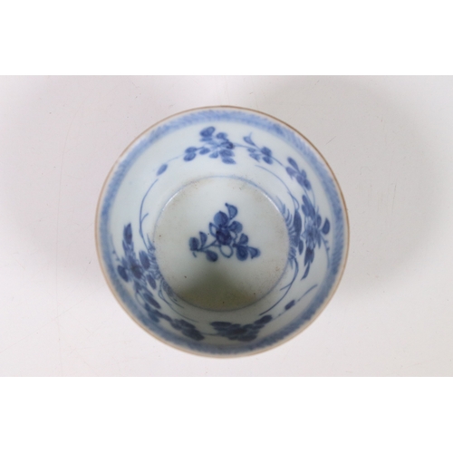 217 - An antique Chinese blue & white dish and tea bowl, recovered from a shipwreck, dates to c.1725.