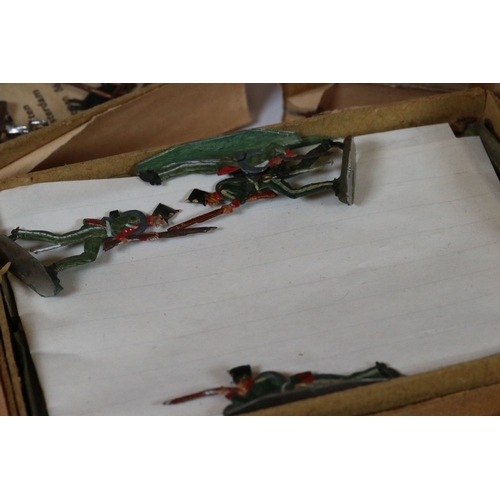 226 - A collection of vintage flat tin toy soldiers to include infantry, bandsmen and cavalry examples, co... 