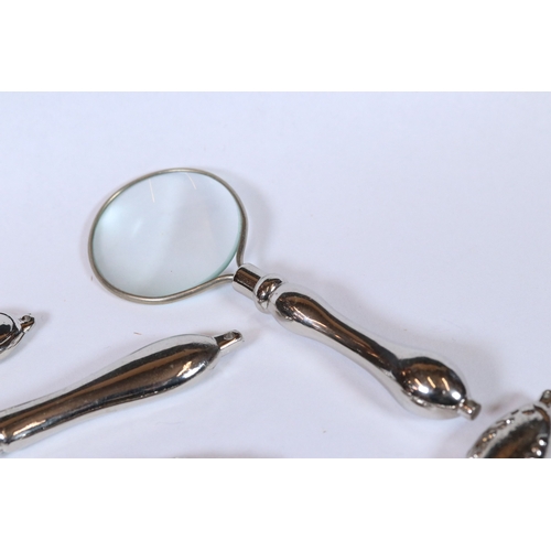 231 - Set of six graduated magnifying glasses with silver plated handles