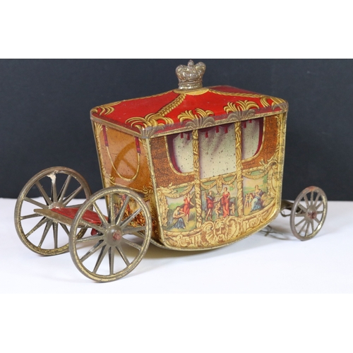 242 - A vintage W. & R. Jacob & Co Ltd biscuit tin in the form of a rolling carriage.