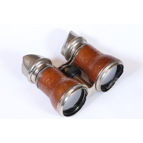 245 - A pair of early 20th century French leather covered binoculars.