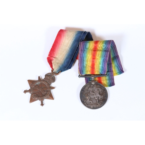 246 - A pair of full size British World War One medals to include the 1914-15 star and the British war med... 