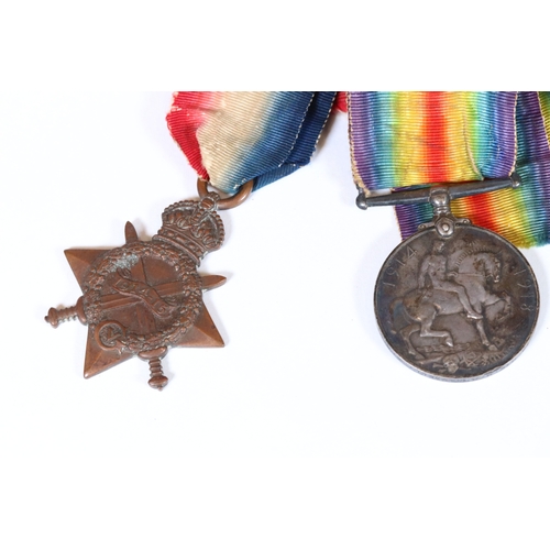 246 - A pair of full size British World War One medals to include the 1914-15 star and the British war med... 