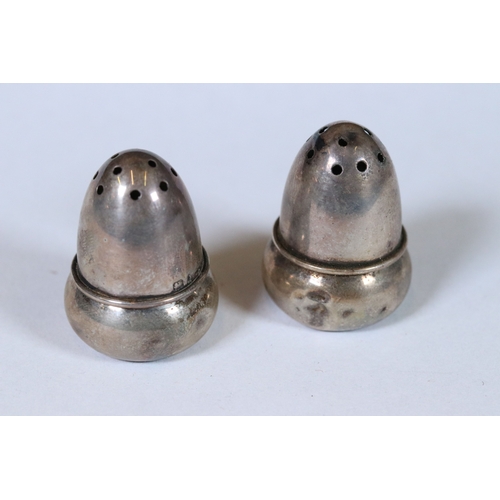 247 - A pair of hallmarked silver salt shakers in the form of Acorns within fitted display case, together ... 