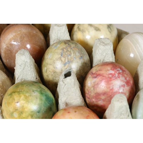 262 - Colleciton of fifteen carved and polished stone eggs, largest 6.5cm high