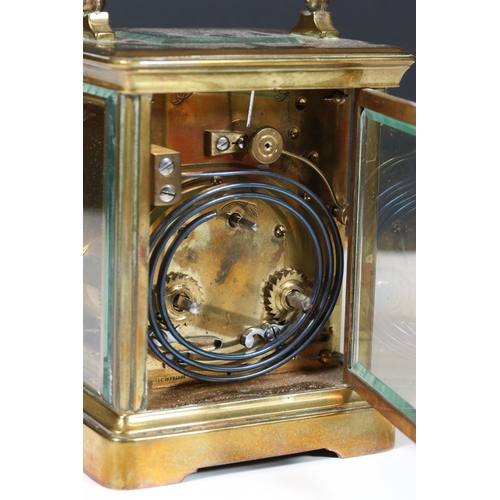 263 - French brass cased carriage clock, early 20th century, 2.5 inch white enamelled dial with Roman nume... 