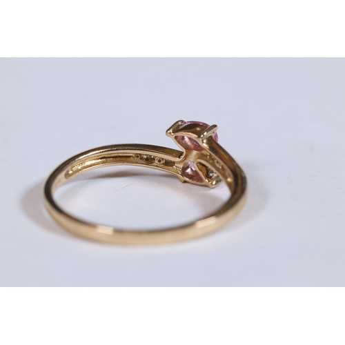 273 - 9ct gold pink sapphire and diamond dress ring