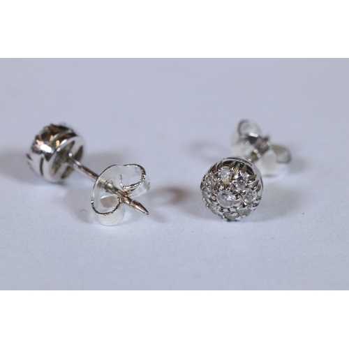 279 - Pair of 14ct white gold and diamond stud earrings