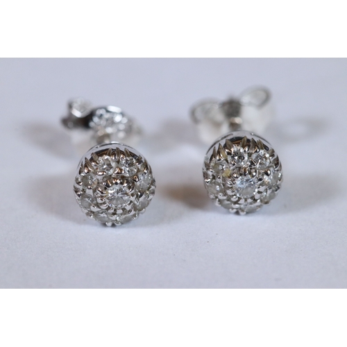 279 - Pair of 14ct white gold and diamond stud earrings