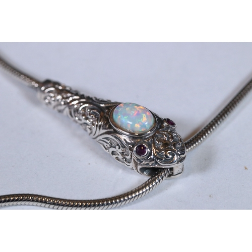 288 - Silver snake's head necklace with opal panel set to the head