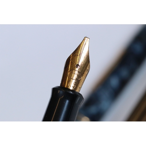 292 - Three vintage fountain pens with two having 14k gold nibs together with a white metal bridge pen.