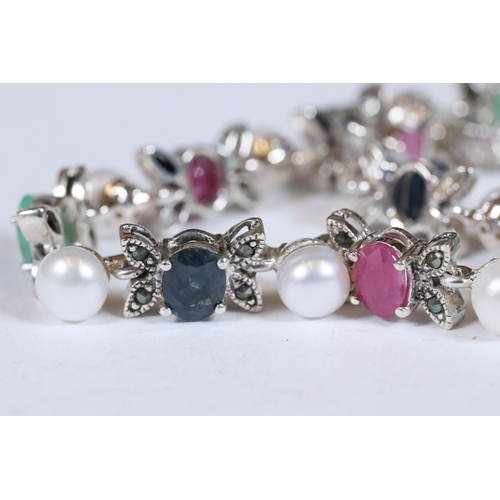 293 - Multi silver stone set bracelet to include sapphire, ruby and emerald