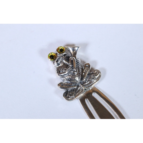 294 - Silver bookmark with frog playing a saxophone