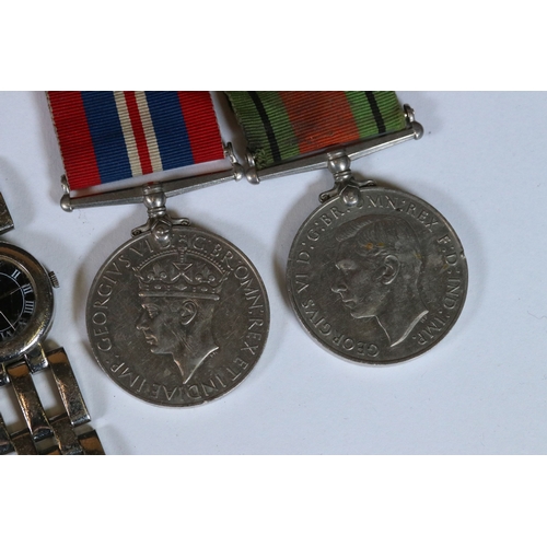 308 - A small group of mixed collectables to include British full size world war two medals, pocket watch ... 