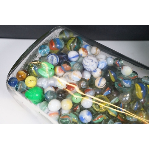 458 - Two glass jars of mixed vintage marbles in varying sizes