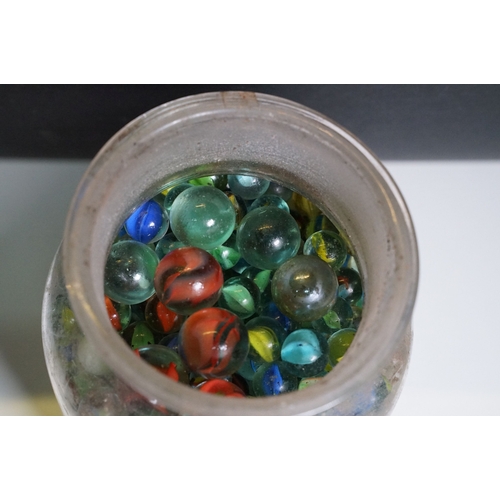 458 - Two glass jars of mixed vintage marbles in varying sizes